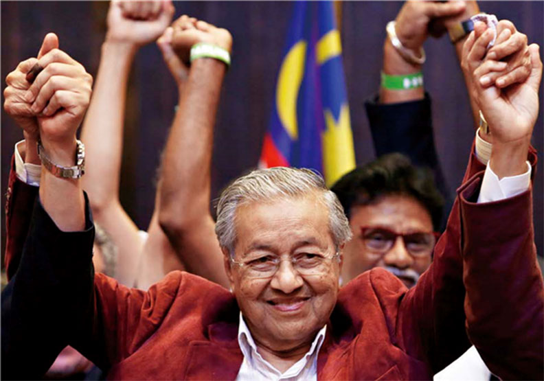 93歲的馬哈迪回鍋擔任馬來西亞首相，上任後嚴厲打貪，扭轉政府貪腐歪風。圖／達志影像。