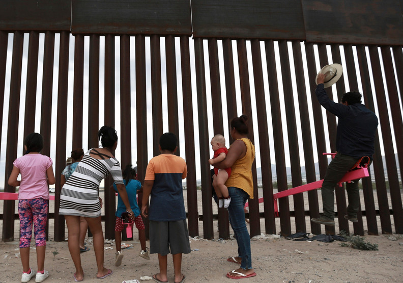 超越藩籬的愛!美墨邊境孩子開心樂玩蹺蹺板_img_5