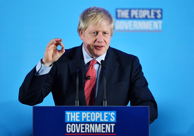 圖／英國首相強森率領的保守黨在12日英國舉行的國會大選中大獲全勝。達志影像
