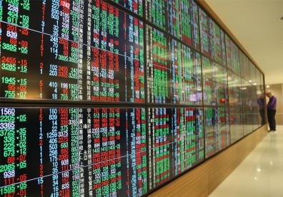 台股去年創新高，終於賺錢的勞動基金績效為何落後大盤？