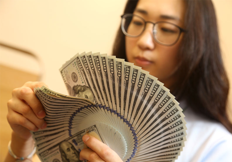 圖／美元將「有利可圖」？張智傑攝