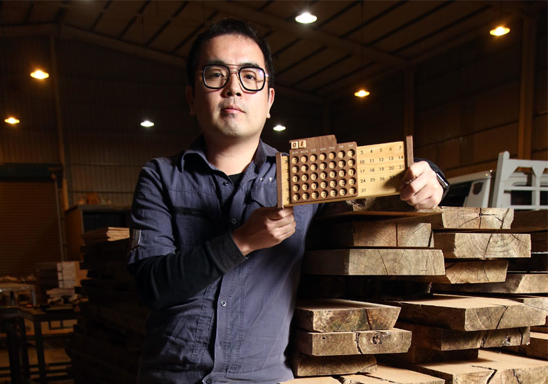 洲宇木業老闆汪宇。陳之俊攝。