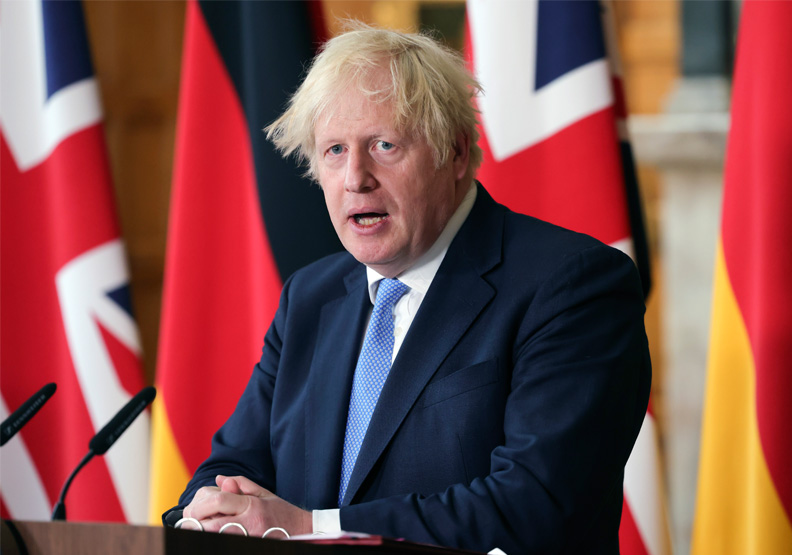 圖／英國首相強生宣布將按照預定的7月19日解封。Flickr by Number 10