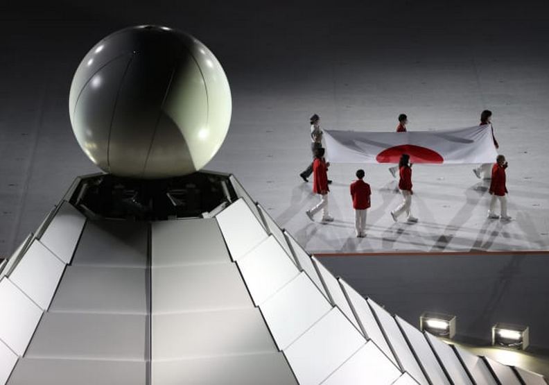 日本國旗進場。olympics.com