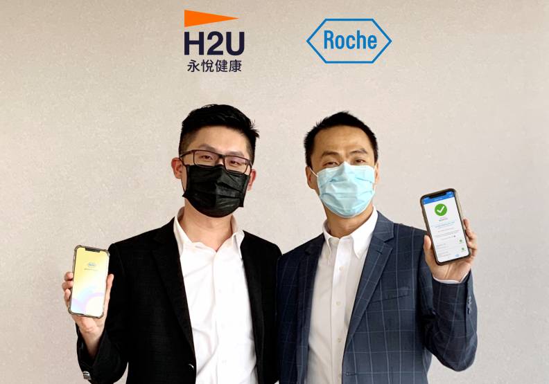 H2U永悅健康執行長陳俊嘉（左）、台灣羅氏診斷總經理鄧傑成（右）合影。H2U永悅健康提供