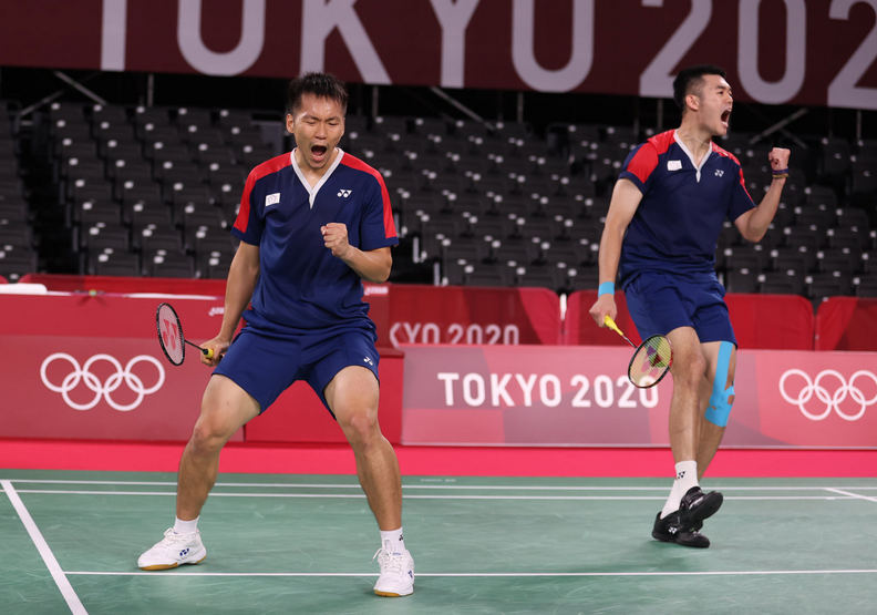 東京奧運時的李洋與王齊麟。體育署