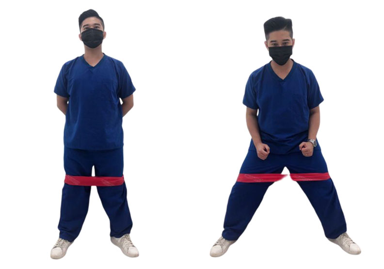 利用彈力帶練習側向走。台灣運動醫學學會提供