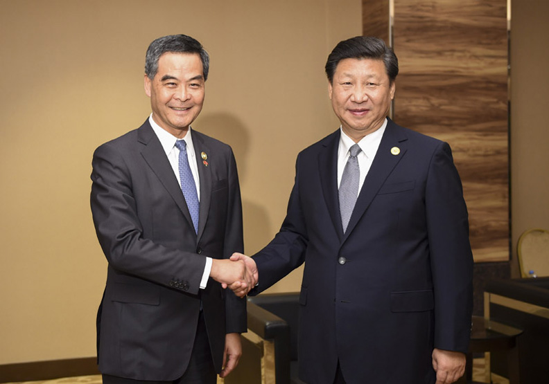 圖／左為香港前特首梁振英、右為中國國家主席習近平。取自中華人民共和國中央人民政府官網