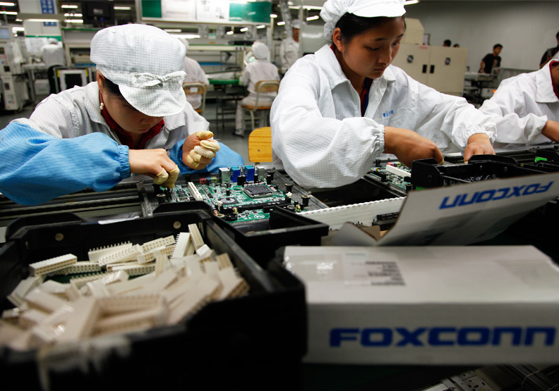 為穩定iPhone的生產,鄭州富士康祭出全勤獎勵。圖為示意圖。蘇義傑攝